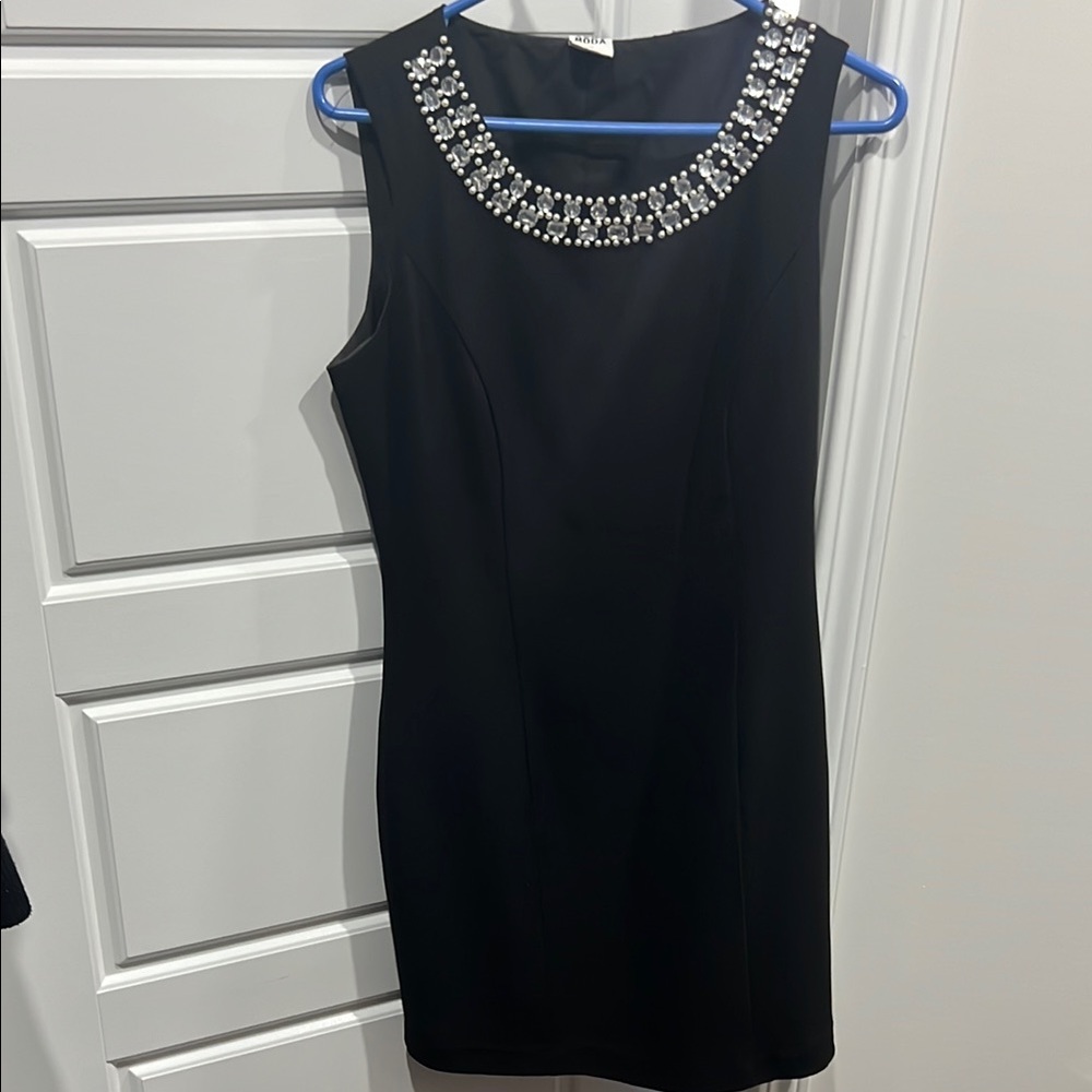 Elegant Black Dress with Embellished Neckline